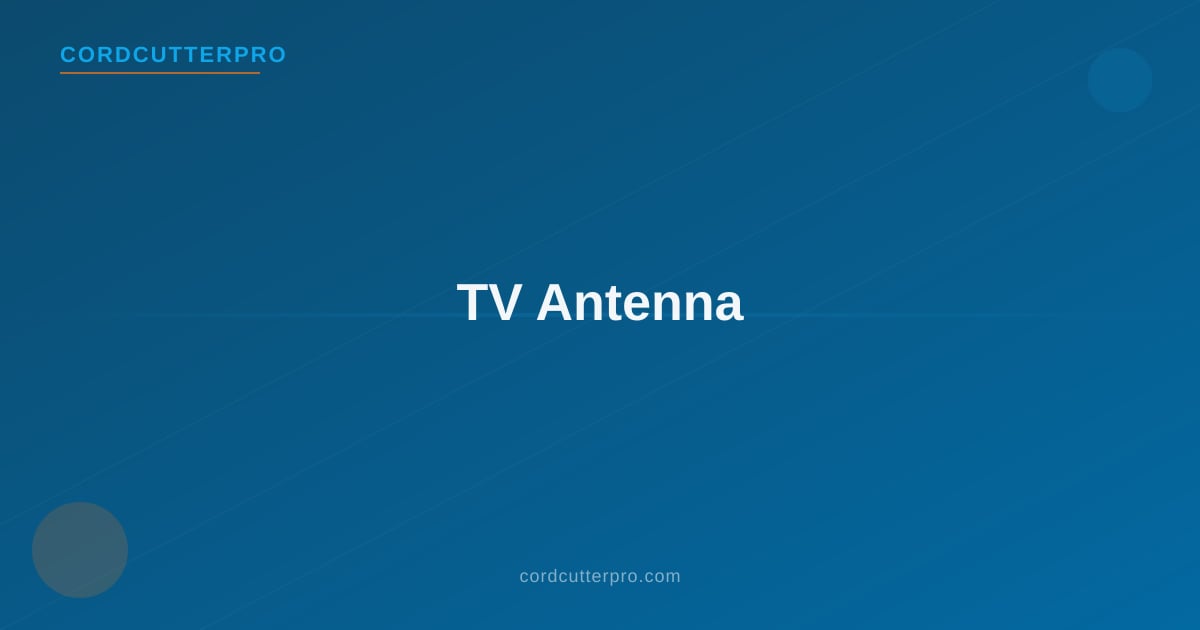 Outdoor TV antenna mounted on a roof pole against a clear blue sky